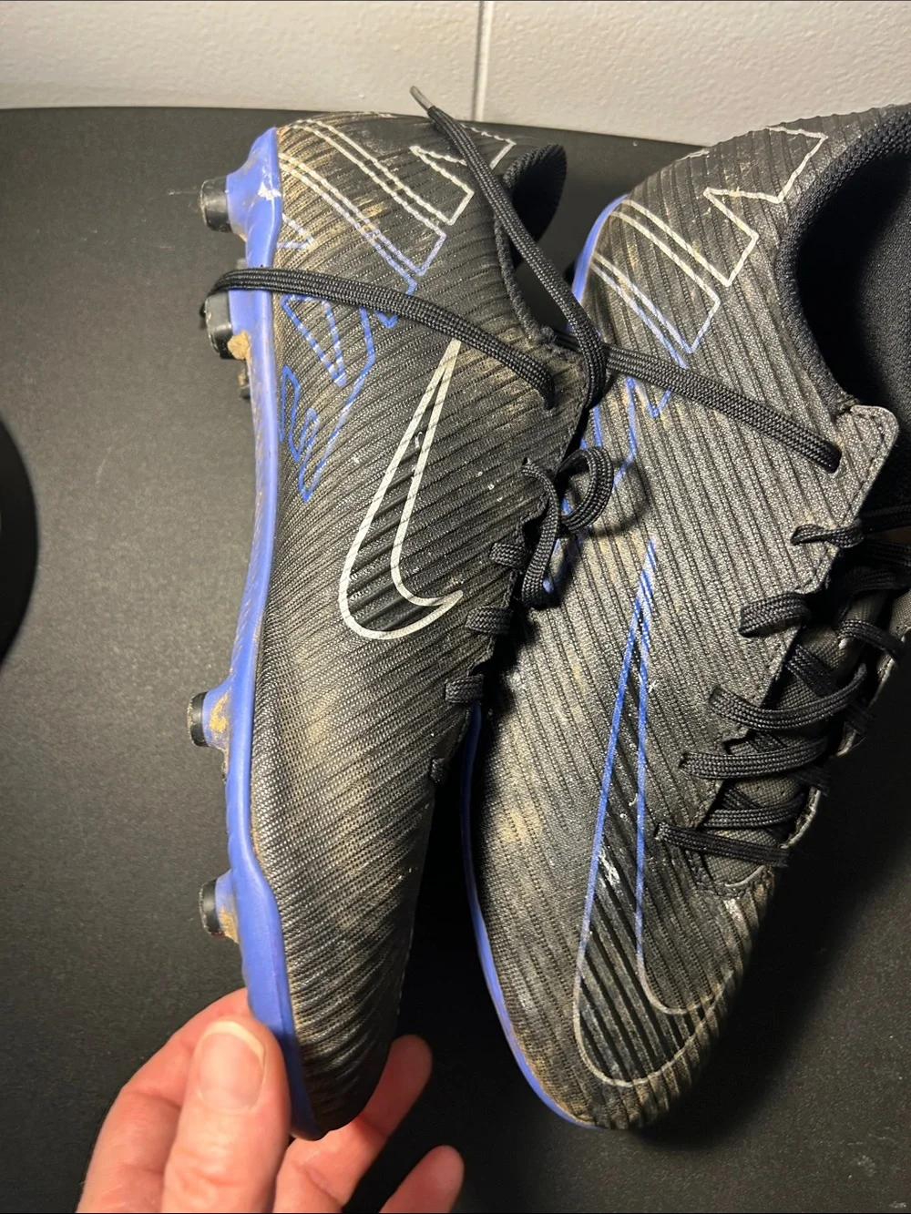 Nike  Black and Blue Soccer Cleat size 8